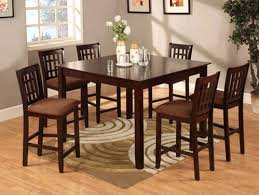 Small rug under dining table